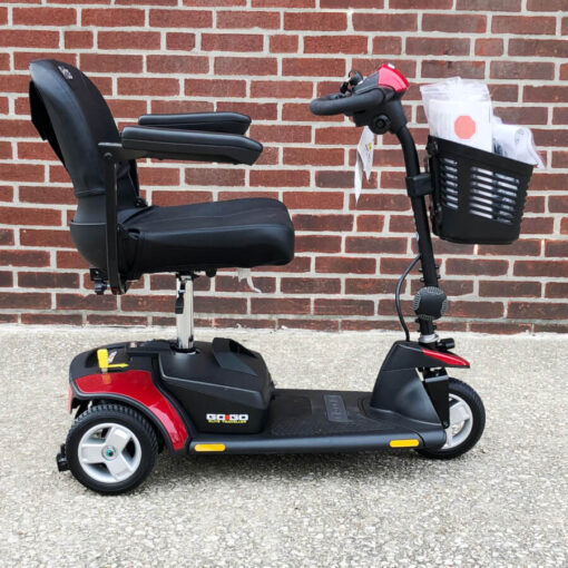 Pride Elite Traveller three wheeled mobility scooter - red - right side view