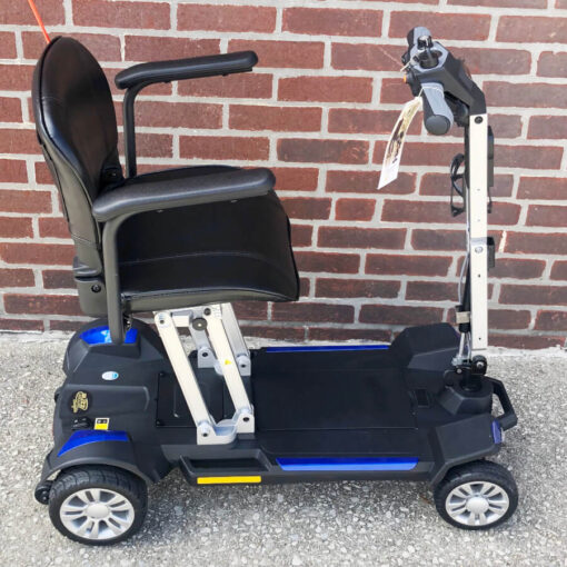 Golden Buzzaround CarryOn folding four wheel mobility scooter with armrests - blue - right side view