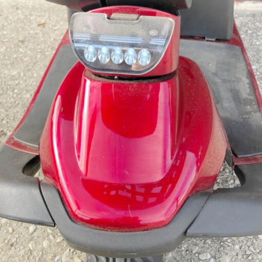 Pride Victory 10 three wheel mobility scooter in red, LED light display
