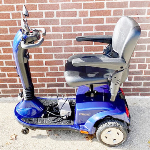 Companion three-wheeled mobility scooter from Golden shown in blue. Left side view